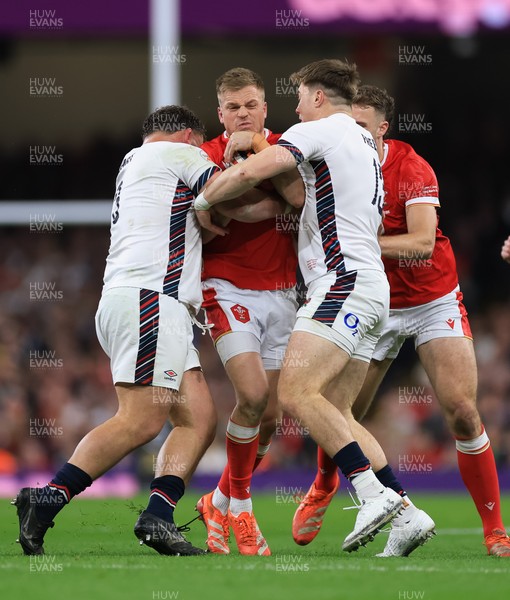 150325 Wales v England, Guinness Mens Six Nations - Gareth Anscombe of Wales takes on Will Stuart of England and Tommy Freeman of England