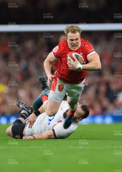 150325 Wales v England, Guinness Mens Six Nations - Blair Murray of Wales is tackled by Luke Cowan-Dickie of England