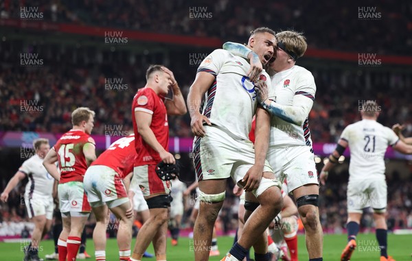 150325 Wales v England, Guinness Mens Six Nations - Chandler Cunningham-South of England celebrates with Henry Pollock of England after scoring the final try