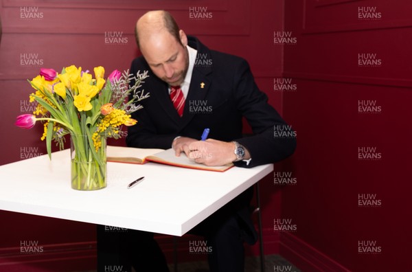 150325 Wales v England, Guinness Mens Six Nations - William, Prince of Wales signs the visitors book at the Principality Stadium after the Wales v England match