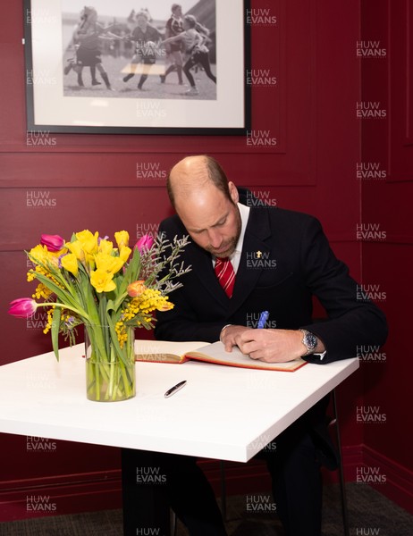 150325 Wales v England, Guinness Mens Six Nations - William, Prince of Wales signs the visitors book at the Principality Stadium after the Wales v England match