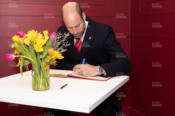 150325 Wales v England, Guinness Mens Six Nations - William, Prince of Wales signs the visitors book at the Principality Stadium after the Wales v England match