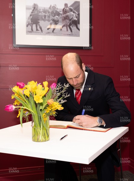 150325 Wales v England, Guinness Mens Six Nations - William, Prince of Wales signs the visitors book at the Principality Stadium after the Wales v England match