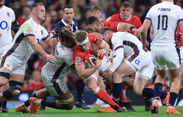 150325 Wales v England, Guinness Mens Six Nations - Aaron Wainwright of Wales is tackled