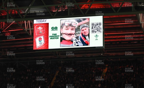 150325 Wales v England, Guinness Mens Six Nations - Go Compare Cache Cam on the stadium screen at half time