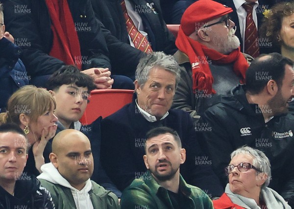 150325 Wales v England, Guinness Mens Six Nations - Hugh Grant watches the match