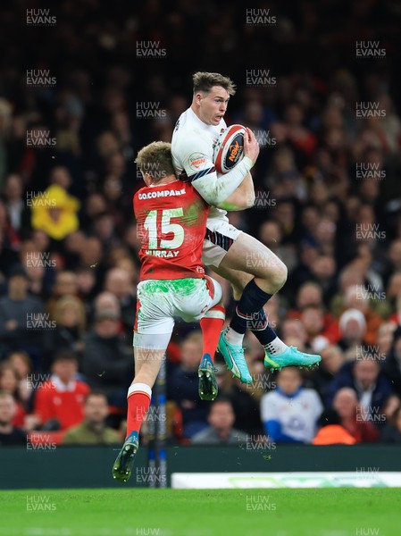 150325 Wales v England, Guinness Mens Six Nations - Blair Murray of Wales and Tom Roebuck of England compete for the ball