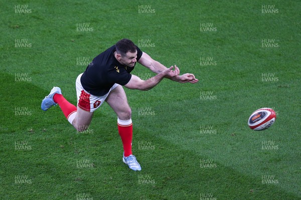 150325 - Wales v England - Guinness Six Nations - Tomos Williams of Wales warms up ahead of the match