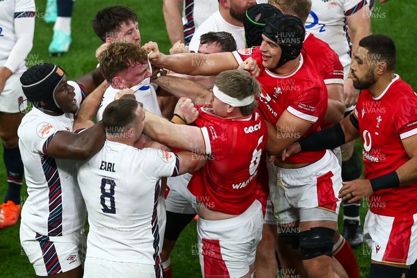 150325 - Wales v England - Guinness Six Nations - The players push and jostle each other