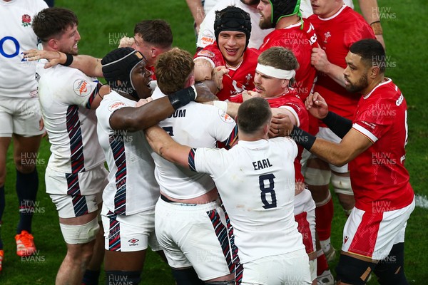 150325 - Wales v England - Guinness Six Nations - The players push and jostle each other