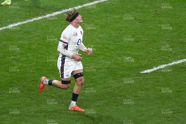 150325 - Wales v England - Guinness Six Nations - Henry Pollock of England runs back after scoring a try