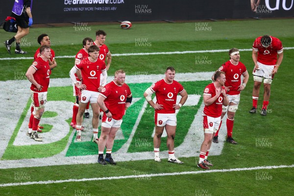 150325 - Wales v England - Guinness Six Nations - Wales look dejected at the end of the match