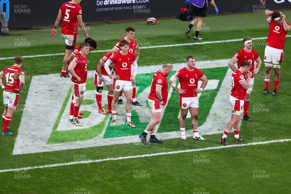 150325 - Wales v England - Guinness Six Nations - Wales look dejected at the end of the match