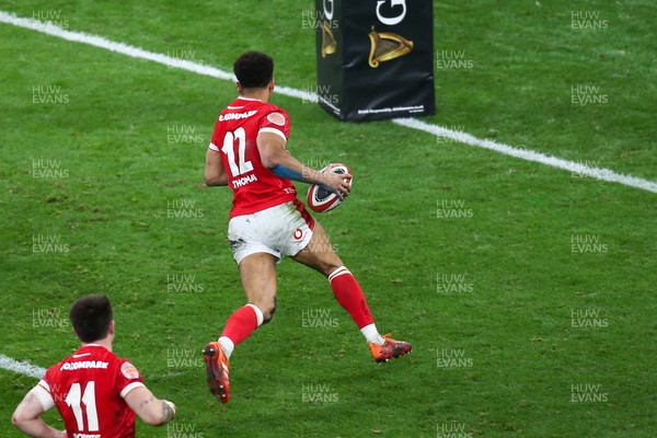 150325 - Wales v England - Guinness Six Nations - Ben Thomas of Wales makes a break to score his second try of the match