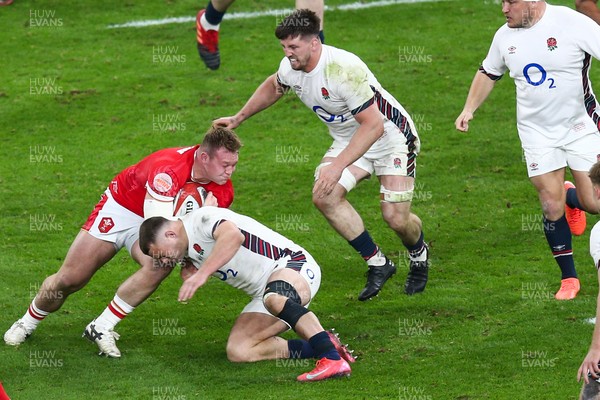 150325 - Wales v England - Guinness Six Nations - Dewi Lake of Wales is tackled by Ben Earl of England