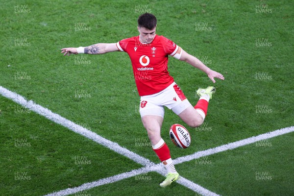 150325 - Wales v England - Guinness Six Nations - Joe Roberts of Wales kicks the ball