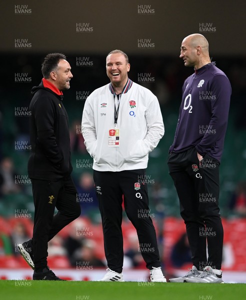 150325 - Wales v England - Guinness Six Nations - Matt Sherratt, Interim Head Coach of Wales (L) interacts with Steve Borthwick, Head Coach of England (R)