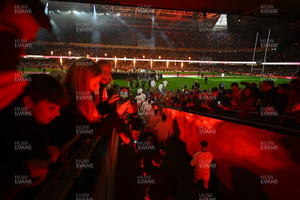 150325 - Wales v England - Guinness Six Nations - Teams run out onto the field