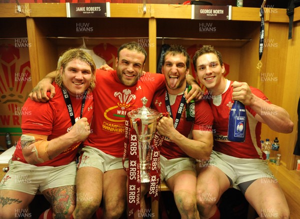 160313 - Wales v England - RBS Six Nations 2013 -Richard Hibbard, Jamie Roberts, Sam Warburton and George North of Wales celebrate in the changing rooms 