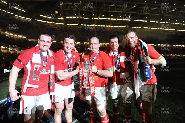 160313 - Wales v England - RBS Six Nations 2013 -Ken Owens, Jonathan Davies, Paul James, Justin Tipuric and Jamie Roberts of Wales celebrate with the trophy at the end of the game 