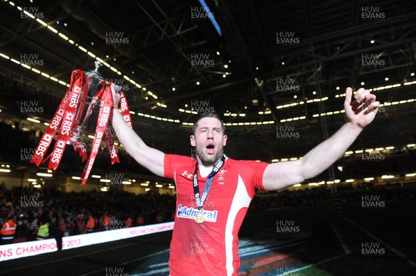 160313 - Wales v England - RBS Six Nations 2013 -Alex Cuthbert of Wales celebrates with the trophy at the end of the game 