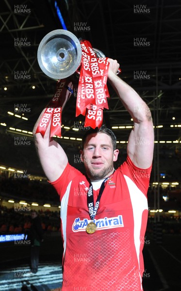 160313 - Wales v England - RBS Six Nations 2013 -Alex Cuthbert of Wales celebrates with the trophy at the end of the game 