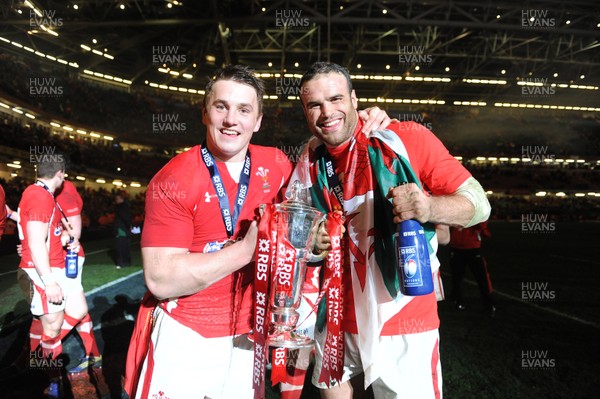 160313 - Wales v England - RBS Six Nations 2013 -Jonathan Davies and Jamie Roberts of Wales celebrate with the trophy at the end of the game 