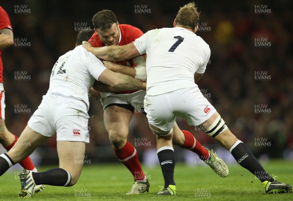 160313 - Wales v England - RBS 6 Nations - Wales' Jamie Roberts takers on England's Brad Barritt and England's Chris Robshaw