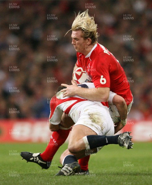 170307 - Wales v England - RBS 6 Nations -  Wales Alix Popham is tackled by Harry Ellis 