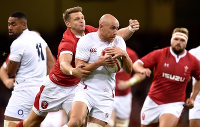 170819 - Wales v England - Under Armour Summer Series - Willi Heinz of England is tackled by Dan Biggar of Wales