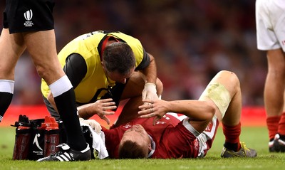 170819 - Wales v England - Under Armour Summer Series - James Davies of Wales is treated by Dr Geoff Davies