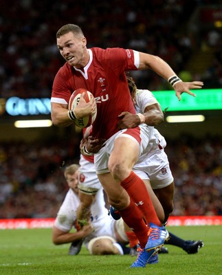 170819 - Wales v England - Under Armour Summer Series - George North of Wales is tackled by Anthony Watson of England