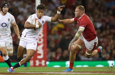 170819 - Wales v England - RWC Warm Up - Under Armour Summer Series - Anthony Watson of England is tackled by Ross Moriarty of Wales