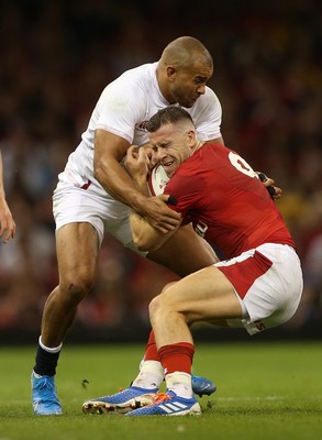 170819 - Wales v England - RWC Warm Up - Under Armour Summer Series - Gareth Davies of Wales is tackled by Jonathan Joseph of England