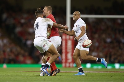 170819 - Wales v England - RWC Warm Up - Under Armour Summer Series - Anthony Watson of England receives a yellow card after this knock on whilst attempting to tackle Hadleigh Parkes of Wales