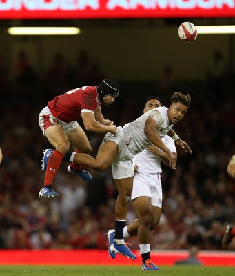 170819 - Wales v England - RWC Warm Up - Under Armour Summer Series - Leigh Halfpenny of Wales and Anthony Watson of England collide in the air