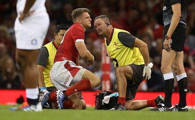 170819 - Wales v England - RWC Warm Up - Under Armour Summer Series - Dan Biggar of Wales is seen to by medical staff