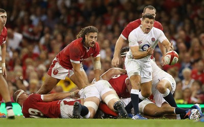 170819 - Wales v England - RWC Warm Up - Under Armour Summer Series - Josh Navidi of Wales looks on as Ben Youngs of England feeds the ball out