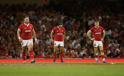 170819 - Wales v England - RWC Warm Up - Under Armour Summer Series - Wyn Jones, Leigh Halfpenny and Gareth Davies of Wales