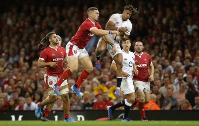 170819 - Wales v England - RWC Warm Up - Under Armour Summer Series - George North of Wales and Anthony Watson of England go up for the high ball