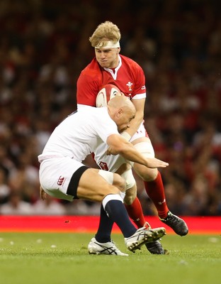 170819 - Wales v England, Under Armour Summer Series 2019 - Aaron Wainwright of Wales  takes on Willi Heinz of England