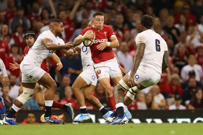 170819 - Wales v England, Under Armour Summer Series 2019 - Josh Adams of Wales takes on the English defence