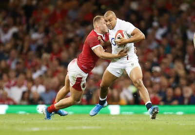 170819 - Wales v England, Under Armour Summer Series 2019 - Jonathan Joseph of England takes on Ross Moriarty of Wales