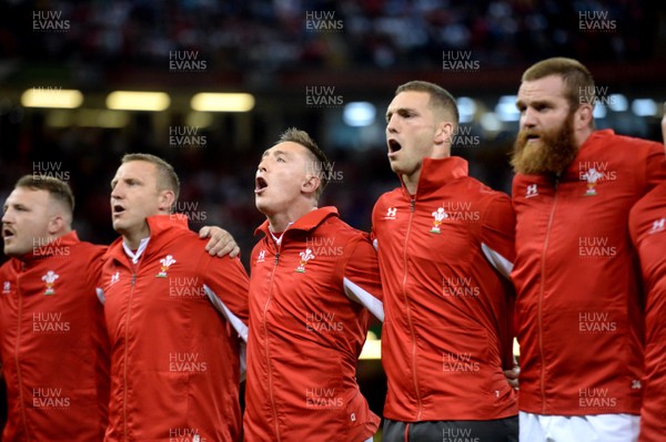 170819 - Wales v England - Under Armour Summer Series - Dillon Lewis, Hadleigh Parkes, Josh Adams, George North and Jake Ball of Wales line up for the anthems