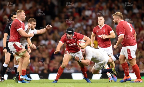 170819 - Wales v England - Under Armour Summer Series - Leigh Halfpenny of Wales is tackled by Dan Cole of England