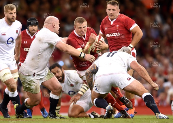 170819 - Wales v England - Under Armour Summer Series - Hadleigh Parkes of Wales is tackled by Dan Cole and Joe Marler of England
