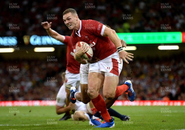 170819 - Wales v England - Under Armour Summer Series - George North of Wales is tackled by Anthony Watson of England