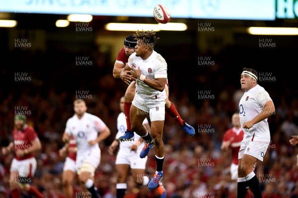 170819 - Wales v England - Under Armour Summer Series - Leigh Halfpenny of Wales and Anthony Watson of England  jump for high ball