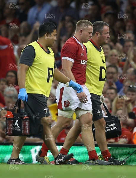 170819 - Wales v England - RWC Warm Up - Under Armour Summer Series - James Davies of Wales leaves the field injured