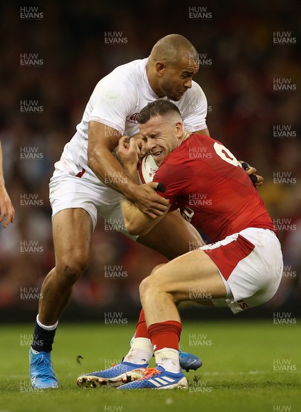 170819 - Wales v England - RWC Warm Up - Under Armour Summer Series - Gareth Davies of Wales is tackled by Jonathan Joseph of England